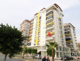 2 + 1 new apartment on Barboros Street, 2 + 1 150 meters from the sea in Alanya mahmutlar